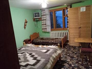 Фото номера Семейный номер с видом на сад Гостевой дом Na gorbochku u Natali г. Ворохта 2