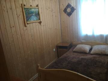 Фото номера Коттедж с 6 спальнями Дома для отпуска Незабутні Карпати г. Ворохта 11